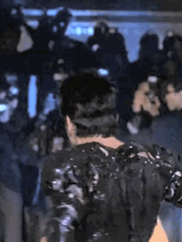Man Covered in Black Wax