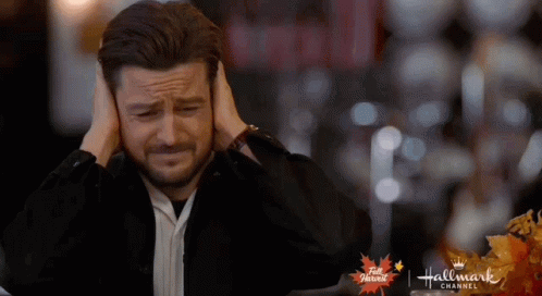 Man Covering Ears Hallmark Channel Logo GIF