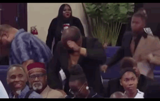 Man Covering Face In Church GIF