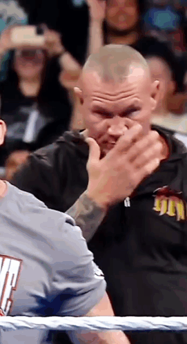 Man Covering Face In Ring GIF
