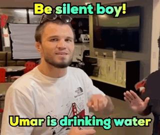 Man Covering Face Saying What a Surprise Umar Is Rizzing You Up Again
