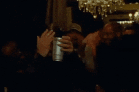 Man Covering Face With Cup