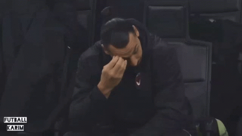 Man Covering Face With Hand Futball Karim