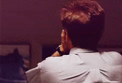 Man Covering Face With Hand Wearing Watch GIF