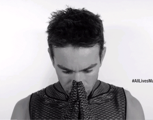 Man Covering Face with Hands