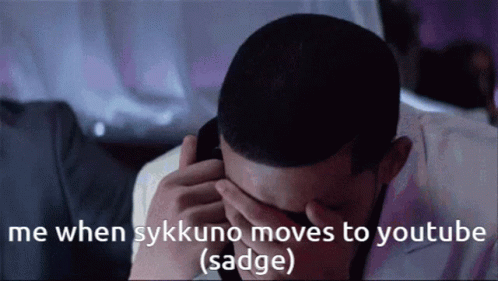 Man Covering Face With Sadge