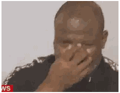 Man Covering Face With WS Logo