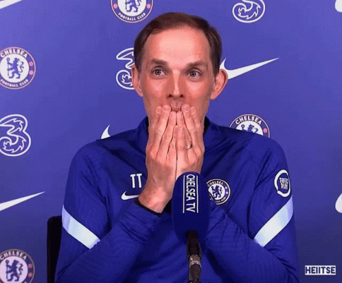 Man Covering Mouth At Microphone Saying Chelsea TV GIF