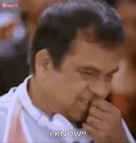 Man Covering Mouth Making Funny Face I Know