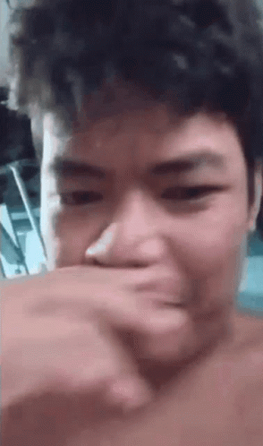 Man Covering Mouth