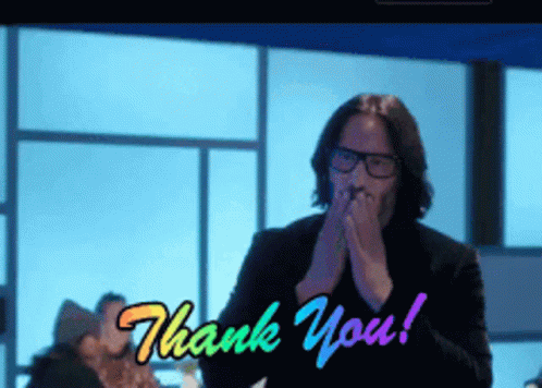 Man Covering Mouth Saying Thank You GIF