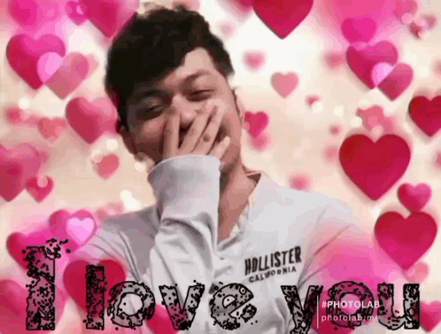 Man Covering Mouth With Hollister Shirt GIF