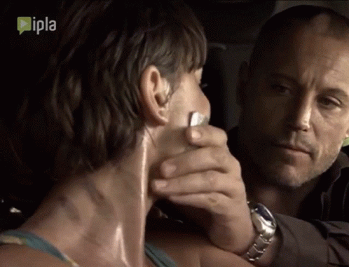 Man Covering Woman's Mouth With Ipla Tape GIF