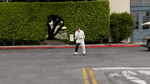 Man Crashed By Gold Cart GIF
