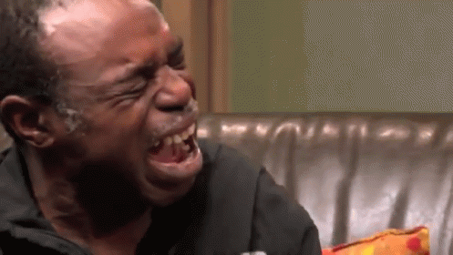 Man Crying on Couch