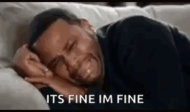 Man Crying on Couch Saying Im Fine