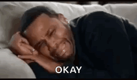 Man Crying on Couch Saying Okay