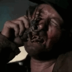 Man Crying Removing Spider GIF