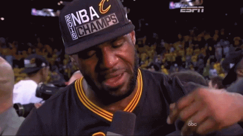 Man Crying Wearing NBA Champs Hat