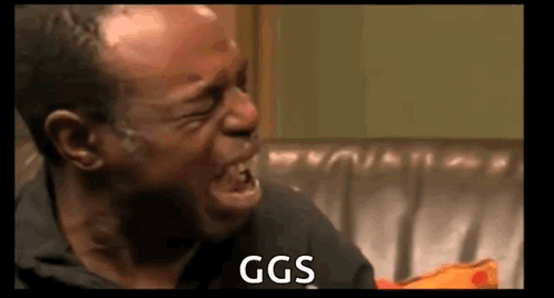 Man Crying While Sitting on a Couch And Screaming