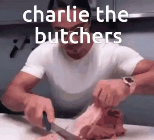 Man Cutting Meat as Charlie the Butchers