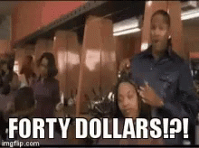 Man Cutting Woman's Hair Saying Forty Dollars GIF