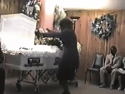 Man Dance In Front Of Coffin GIF