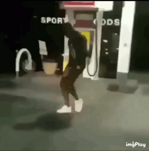 Man Dancing At Gas Pump GIF