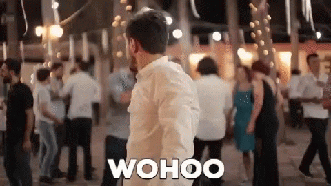 Man Dancing at Party Saying Wahoo