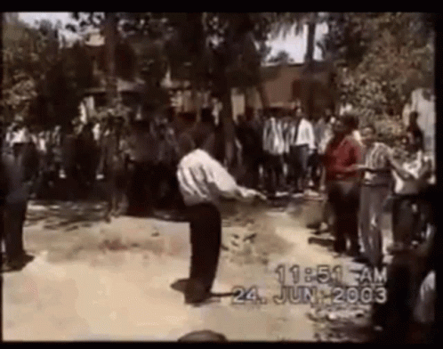 Man Dancing Before Crowd June 24 2003