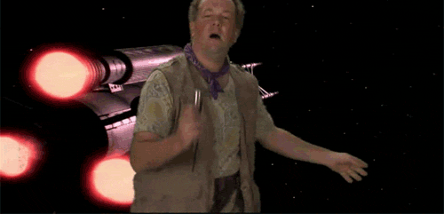 Man Dancing Before Spaceship With Red Lights