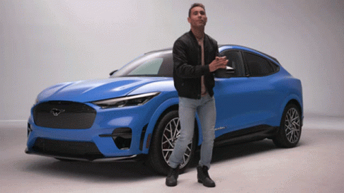 Man Dancing Beside Ford Mustang GIF