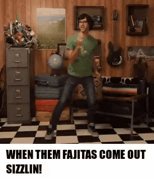 Man Dancing in Checkered Floor Room With Globe