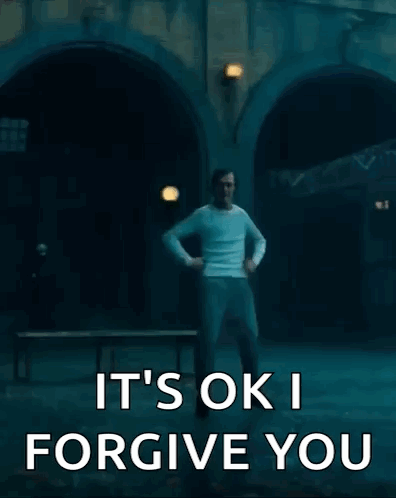 Man Dancing in Dark Room Saying It's Ok I Forgive You