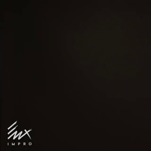 Man Dancing in Dark Room With Ennnnggf