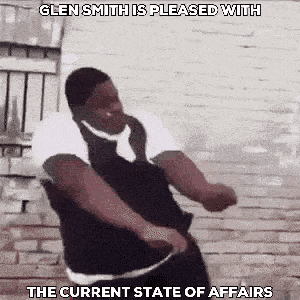 Man Dancing In Front Of Brick Wall GIF