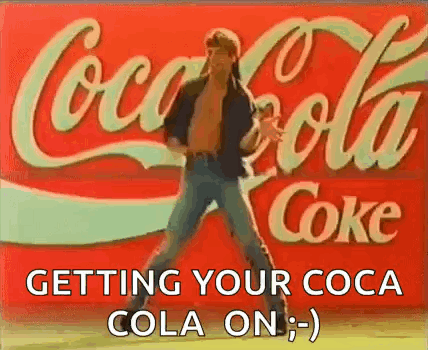 Man Dancing in Front of Coca Cola Sign
