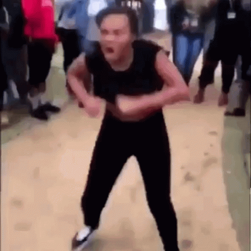 Man Dancing in Front of Crowd