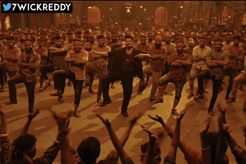 Man Dancing in Front of Crowd with 7wickreddy