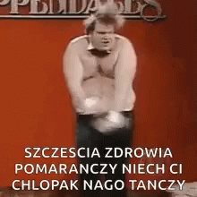 Man Dancing In Front Of Red Wall GIF