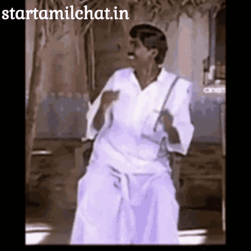 Man Dancing in Front of Starttamilchat.in Sign