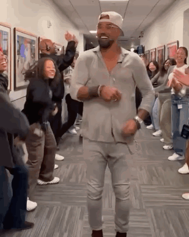 Man Dancing in Hallway