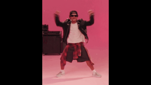 Man Dancing In Leather Jacket And Plaid Shorts GIF
