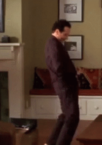 Man Dancing in Living Room