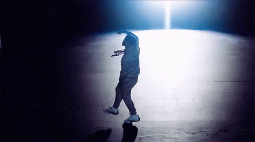 Man Dancing in Spotlight
