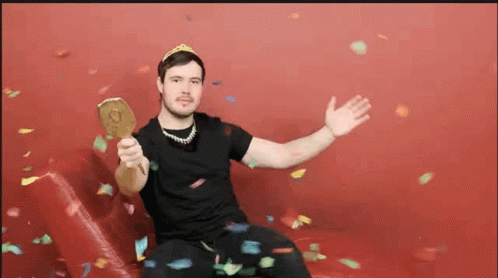 Man Dancing In The Confetti Cannon GIF