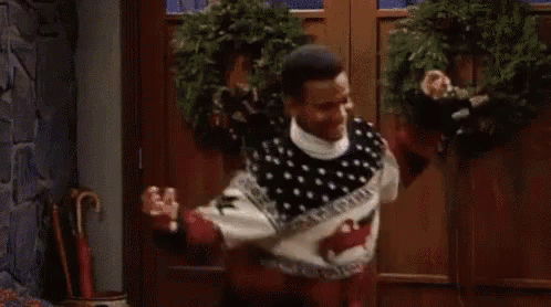 Man Dancing in Ugly Christmas Sweater