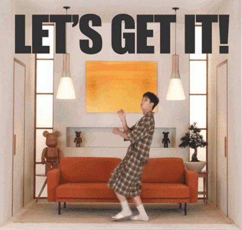 Man Dancing Near Orange Couch Let's Get It