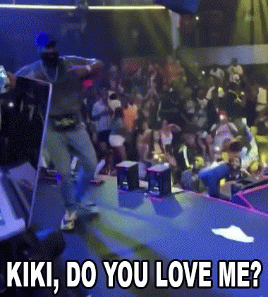 Man Dancing On Stage Saying Kiki Do You Love Me
