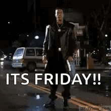 Man Dancing on Street Saying It's Friday